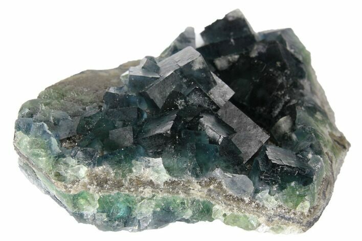 Cubic, Blue-Green Fluorite Crystals on Druzy Quartz - China #128868